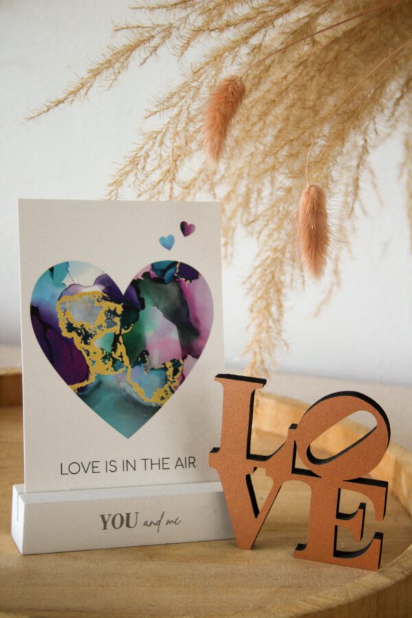 Postkarte mit Hypnose: Love is in the air